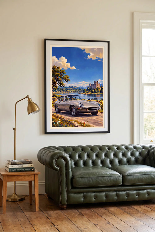 Jaguar E-Type poster shown framed above a green leather Chesterfield sofa (frame not included)
